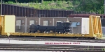 P+H Harnischfeger component rides a company bulkhead flat